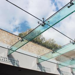 Pool Skylight with Suspended Structural Glass Beams Glasscon.jpg